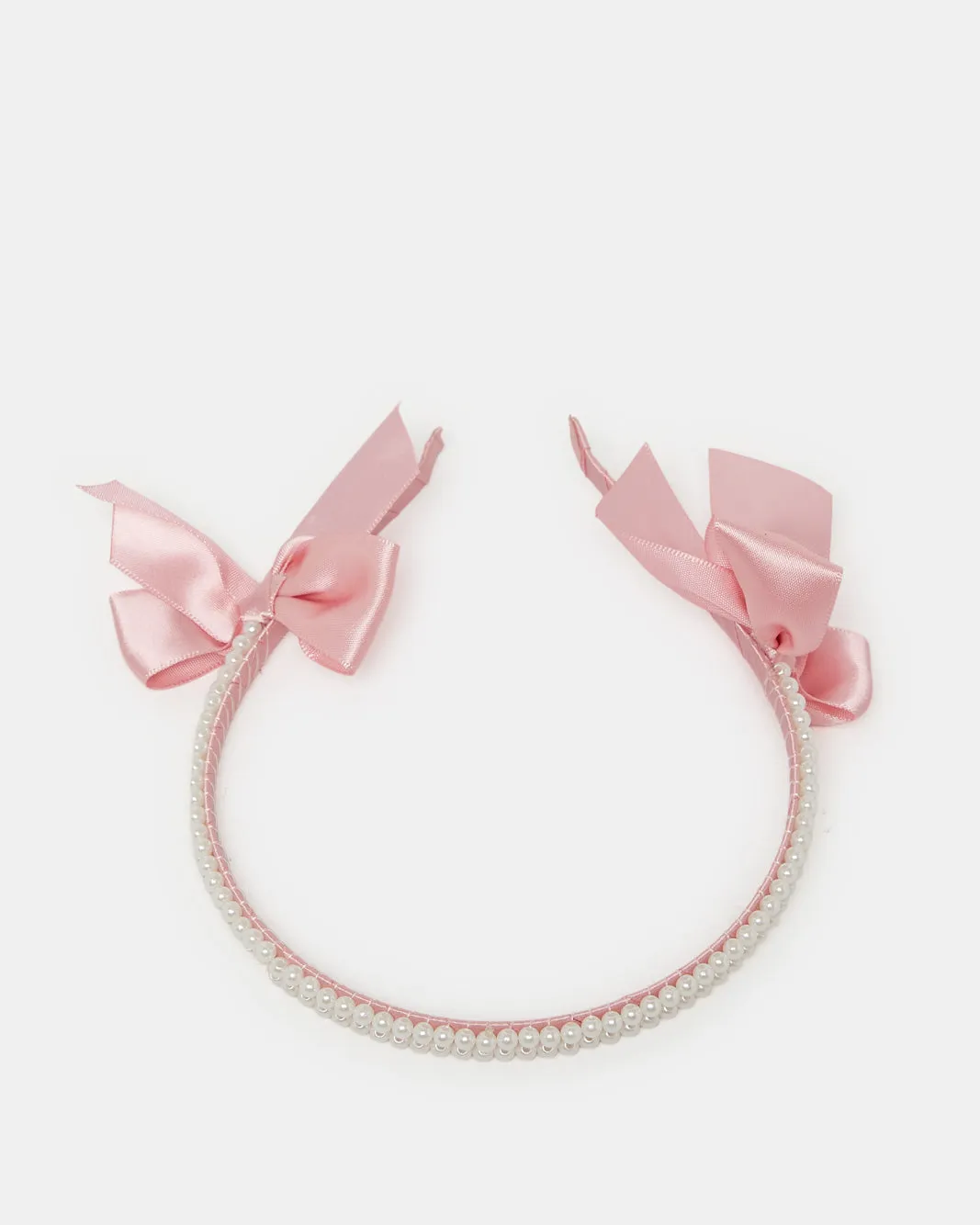 Girls Pink Bow Headband sold by Redtag