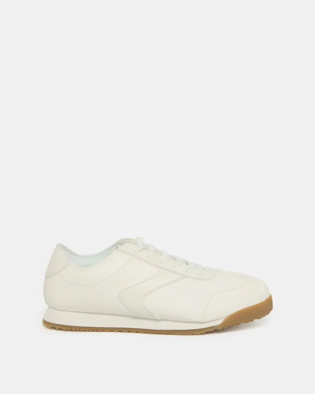 Women White Textured Sneakers sold by Redtag