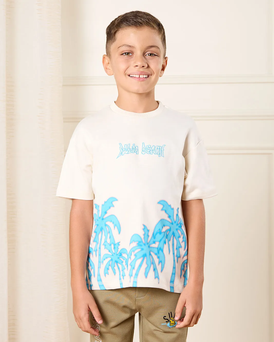 Boys Cream Palm Printed T-Shirt sold by Redtag