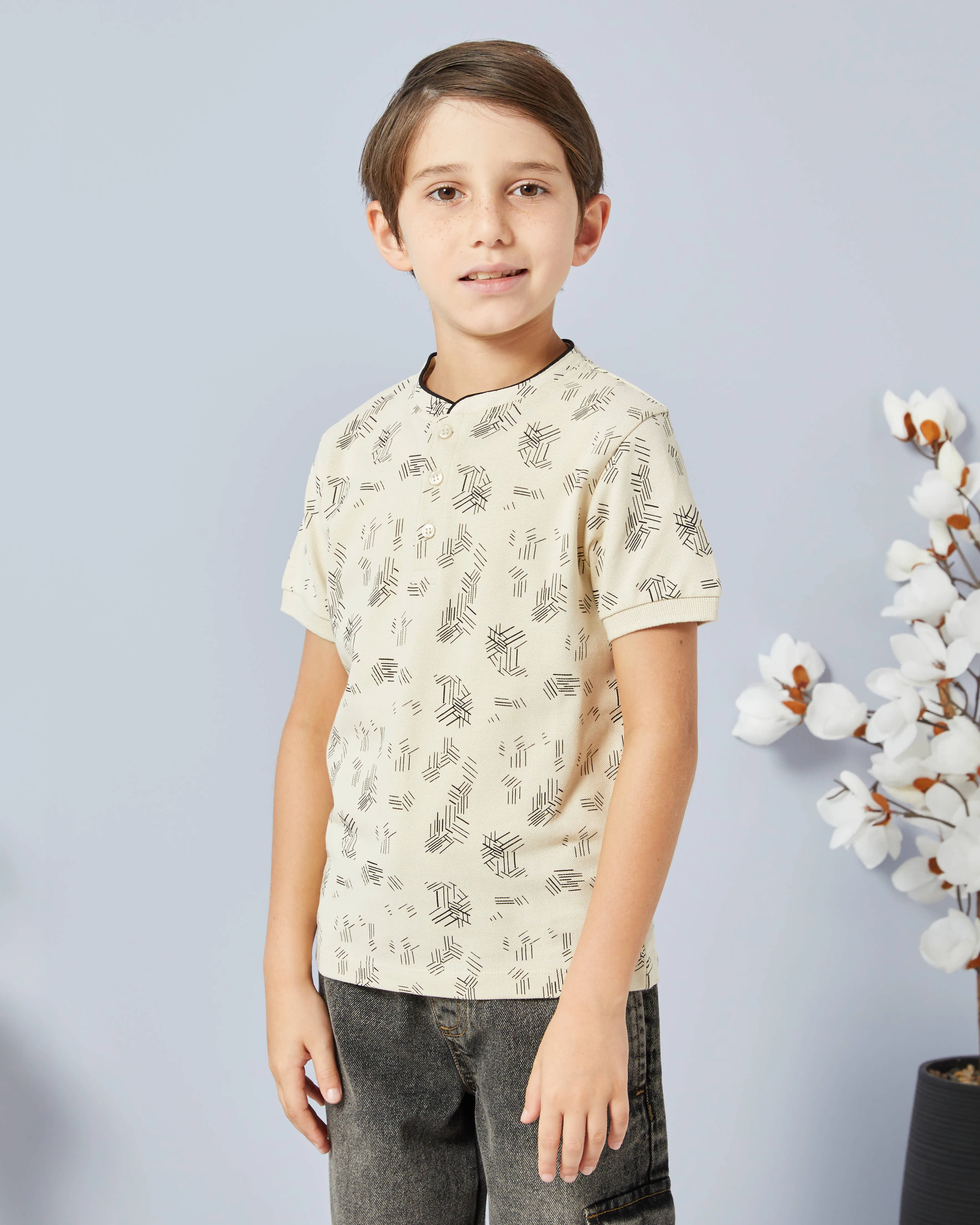 Boys Beige Printed Mandarin Collar Polo sold by Redtag
