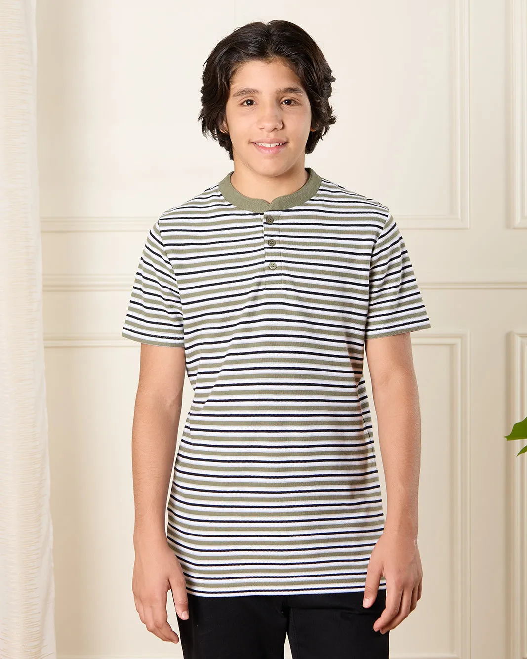 Senior Boys Green Striped Polo Shirt sold by Redtag