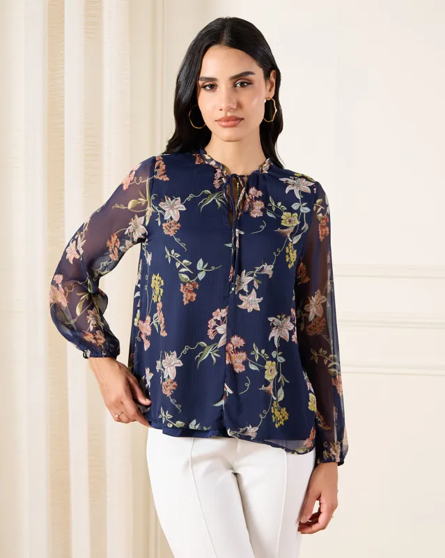 Women Navy Printed Frill Neck Detailed Georgette Blouse sold by Redtag