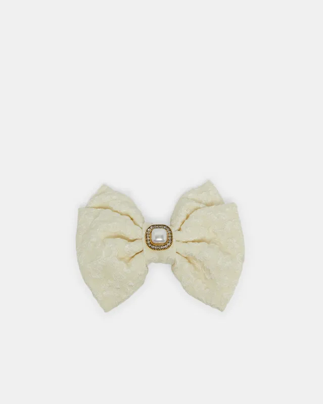 Women Beige Embellished Bow Hair Clip sold by Redtag