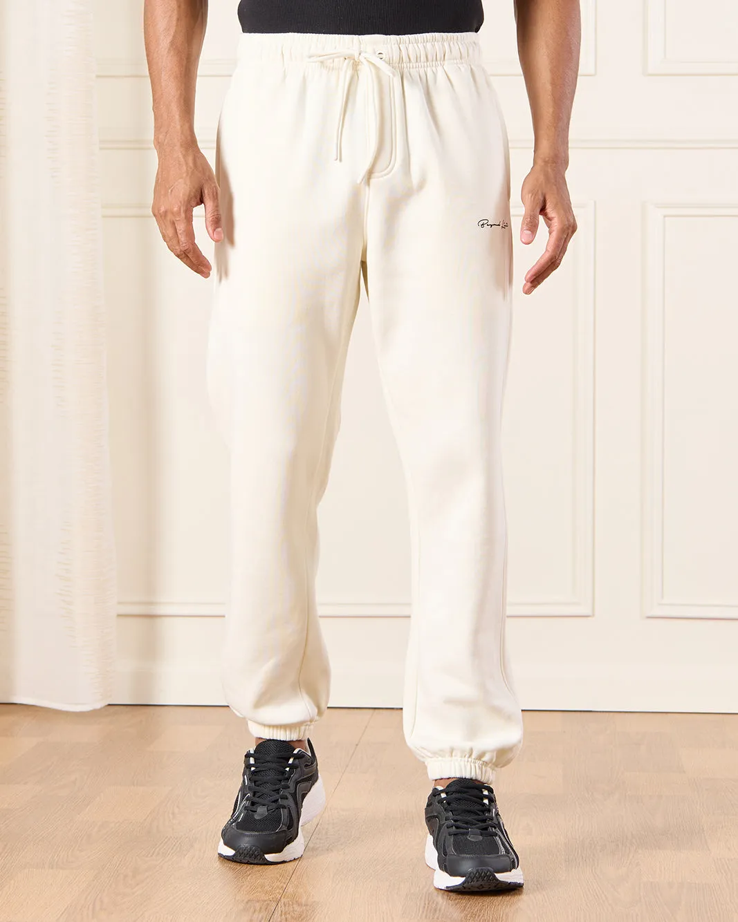 Men Ivory Basic Track Pants With Logo Print sold by Redtag