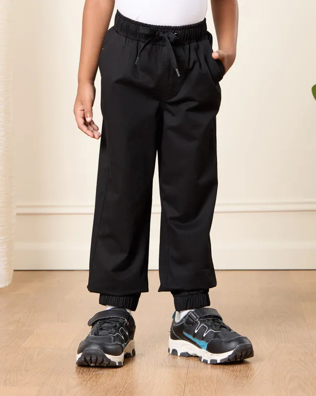 Boys Black Solid Joggers sold by Redtag