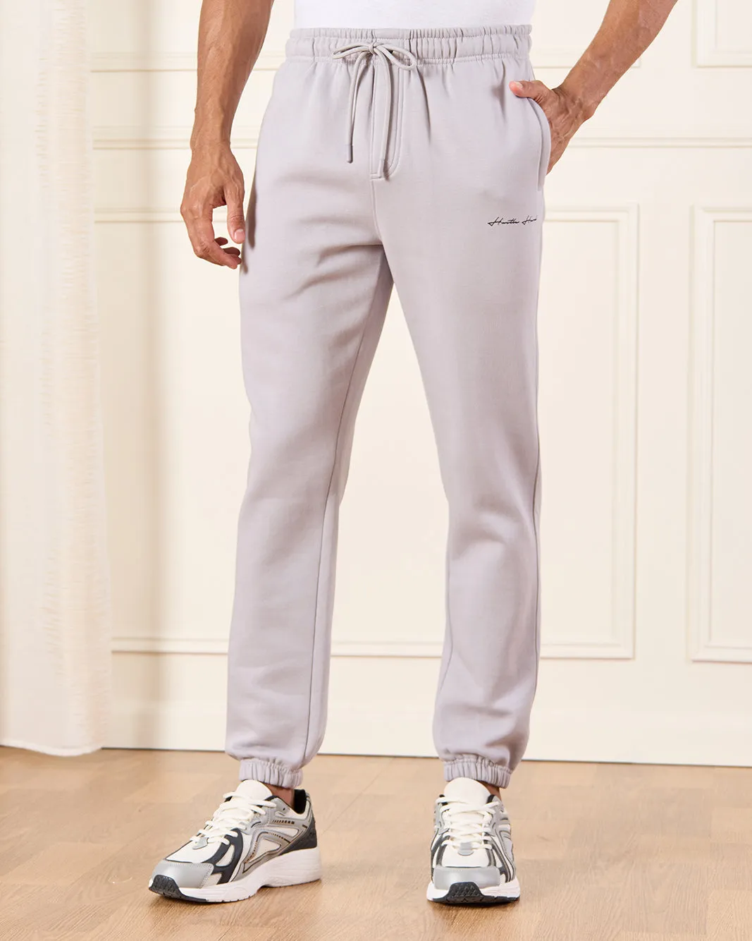 Men Grey Basic Track Pants With Logo Print sold by Redtag