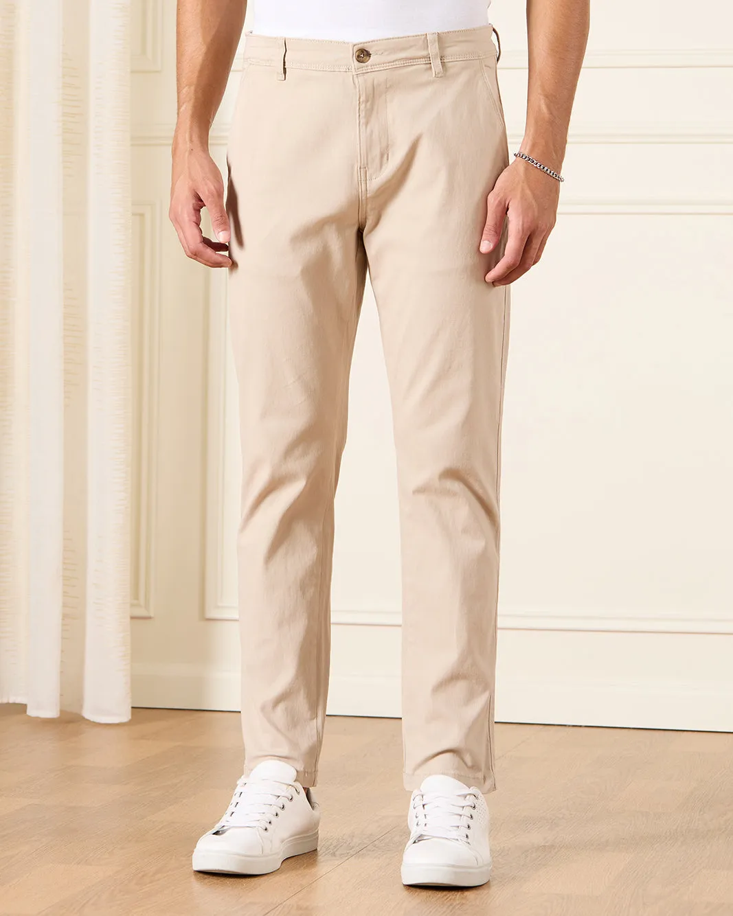 Men Beige Solid Casual Trousers sold by Redtag