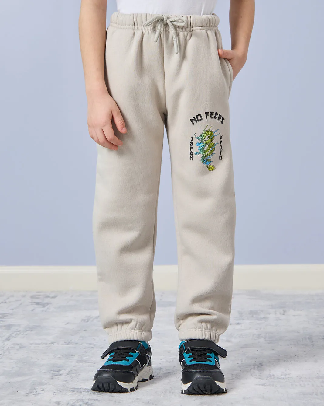 Boys Ivory Embroidered Track Pants sold by Redtag