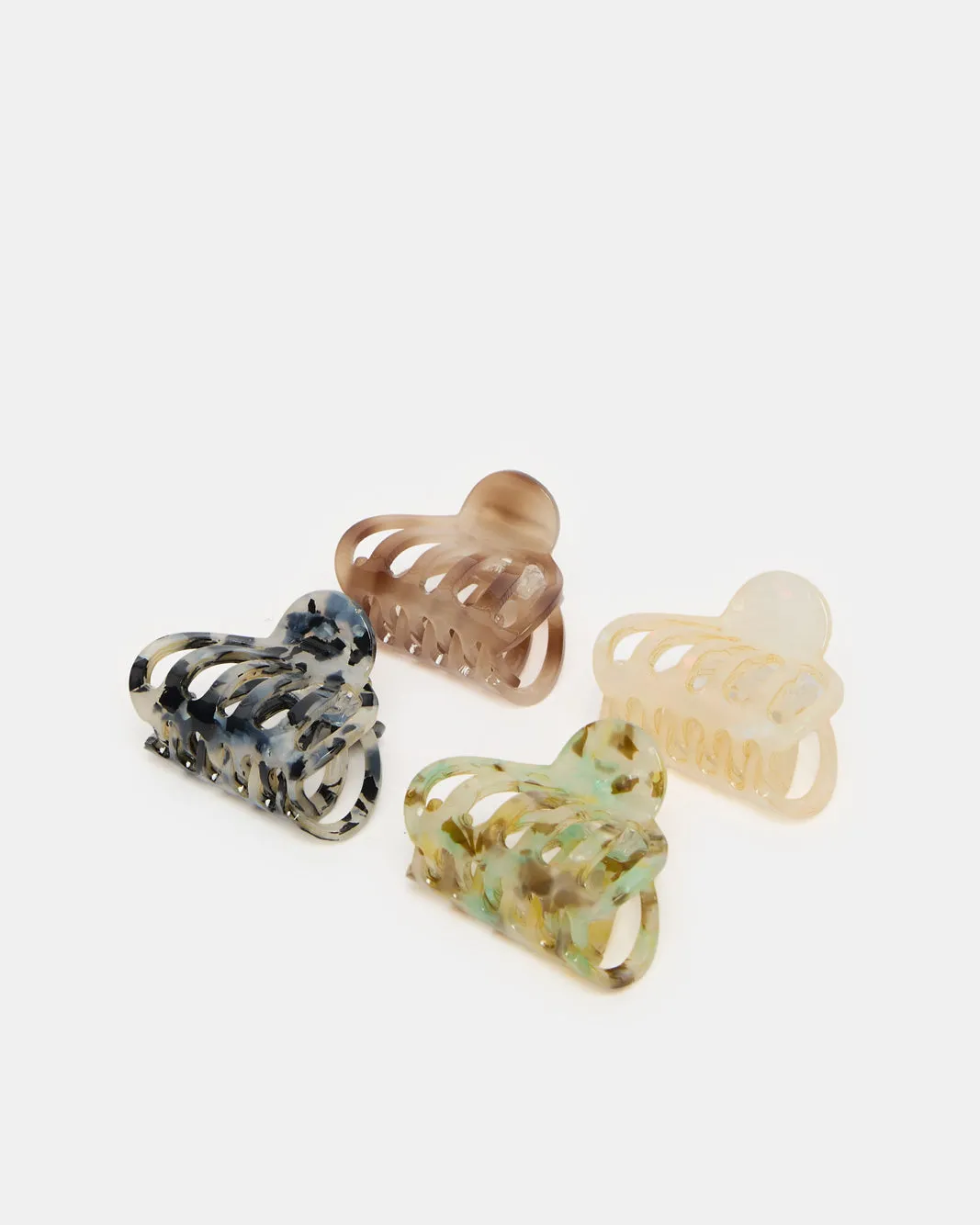 Women Assorted Hair Claw Set (Pack of 4) sold by Redtag