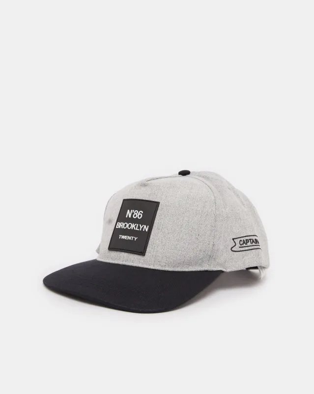 Men Grey And Black Embellished  Cap sold by Redtag