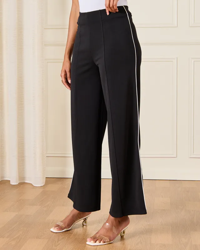 Women Black Piping Embellished Trousers sold by Redtag