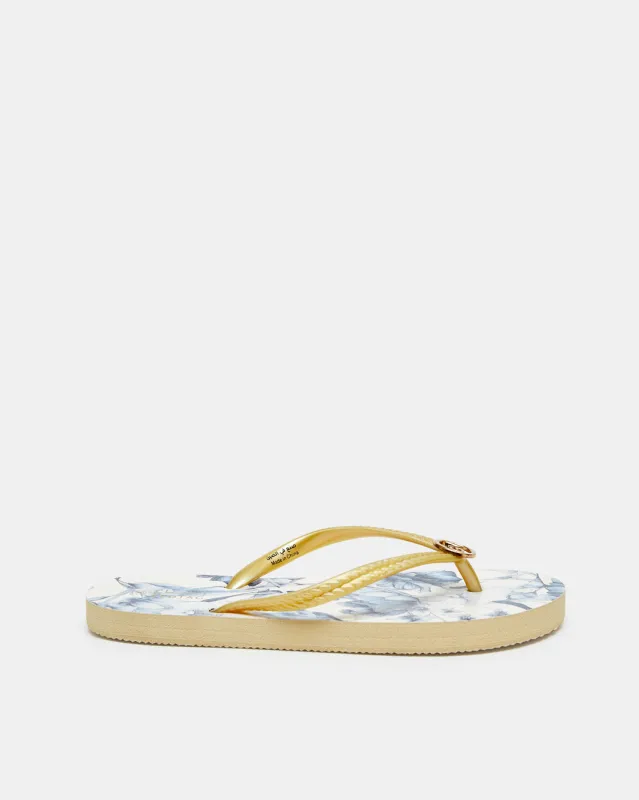 Women Gold Floral Print Flip flop sold by Redtag