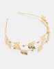 Women Gold Embellished Headband sold by Redtag
