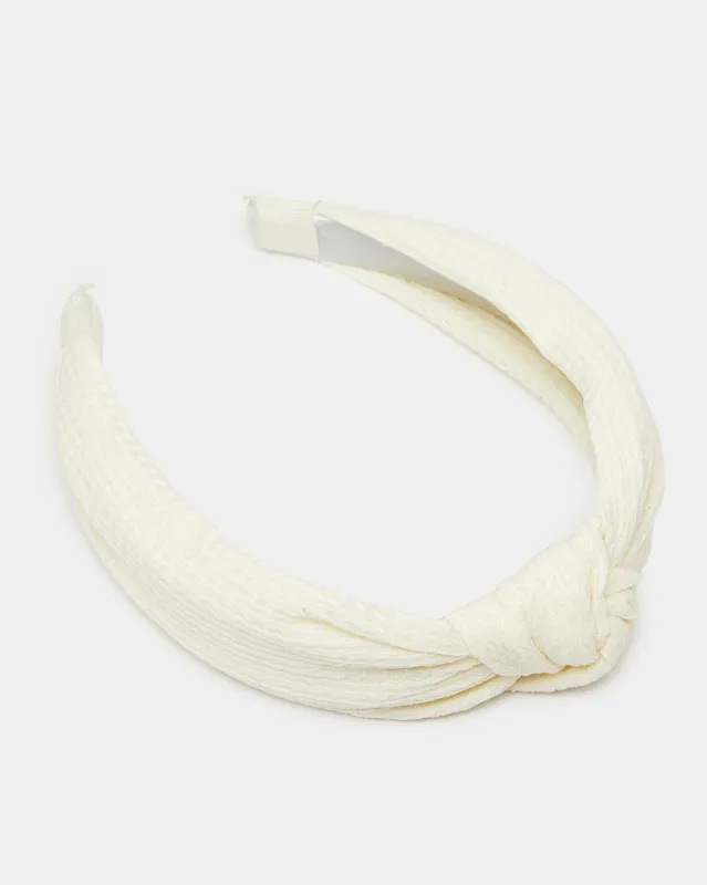 Women White Embellished Headband sold by Redtag