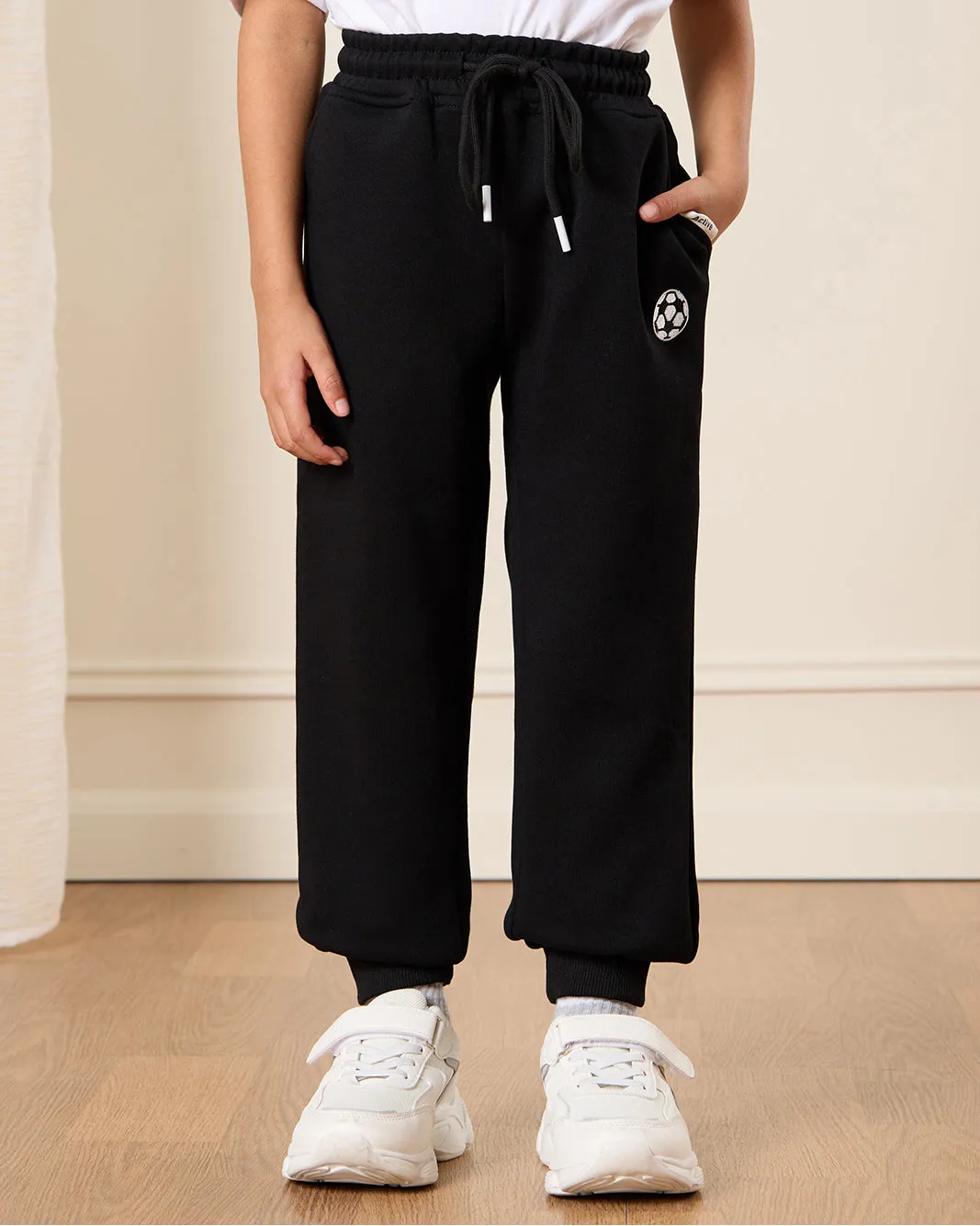 Boys Black Printed Track Pants sold by Redtag