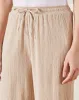 Women Beige Textured Pull On Trouser sold by Redtag