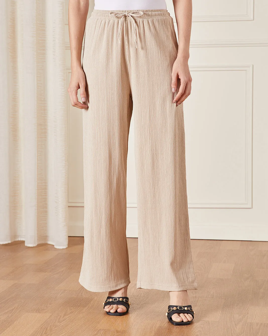Women Beige Textured Pull On Trouser sold by Redtag