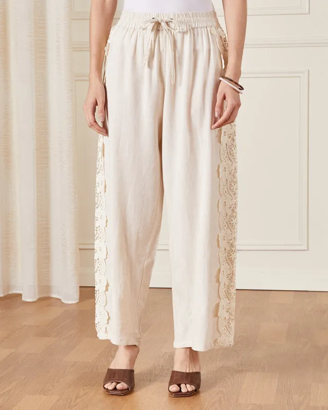 Women Cream Lace Detailed Wide Leg Trousers sold by Redtag