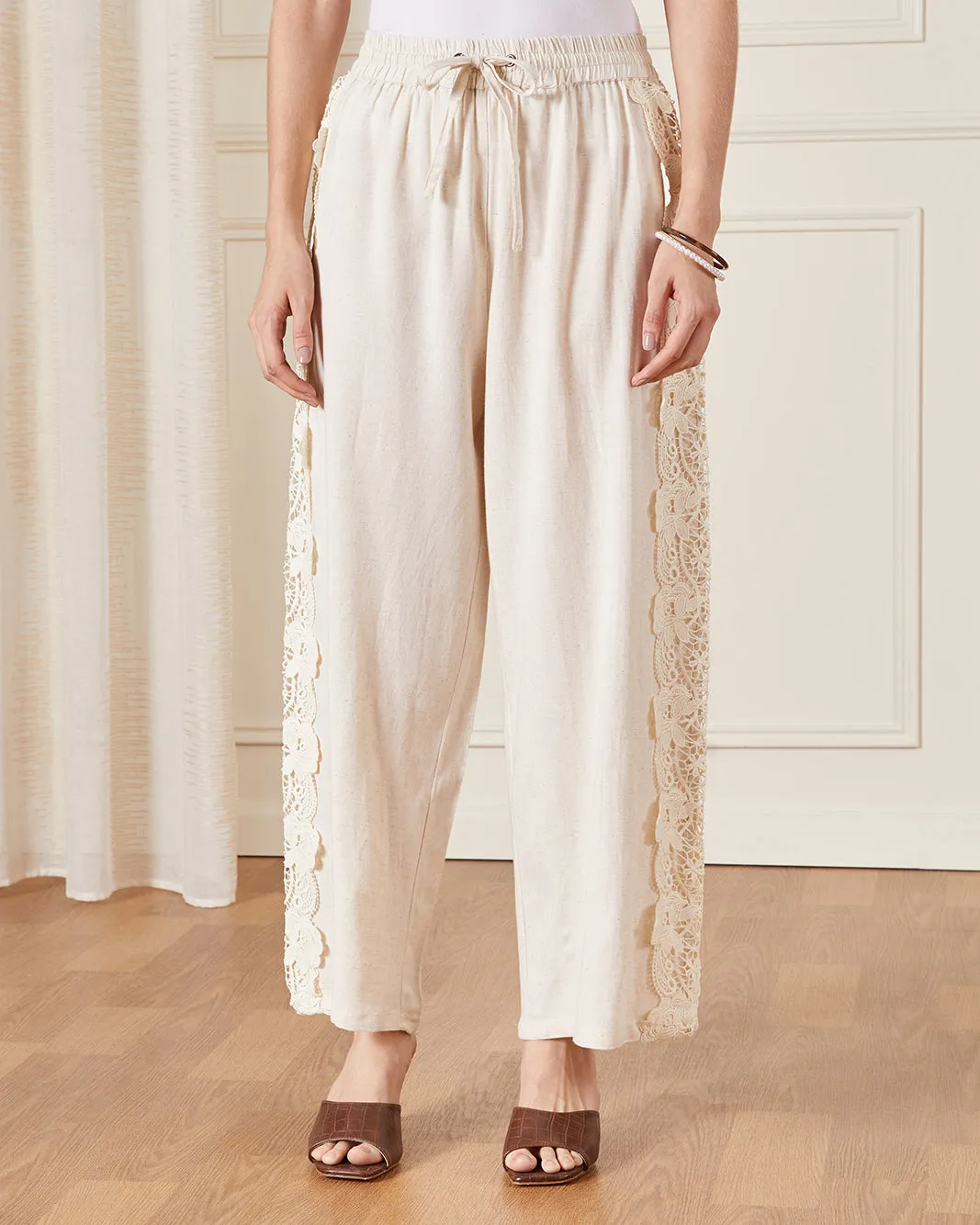 Women Cream Lace Detailed Wide Leg Trousers sold by Redtag