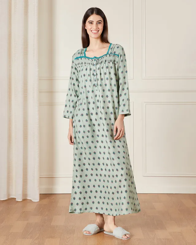 Women Teal Allover Print With Embroidered details Nightgown sold by Redtag