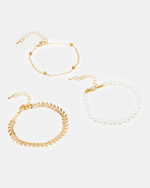 Women Gold Embellished Bracelet Set (Pack of 3) sold by Redtag