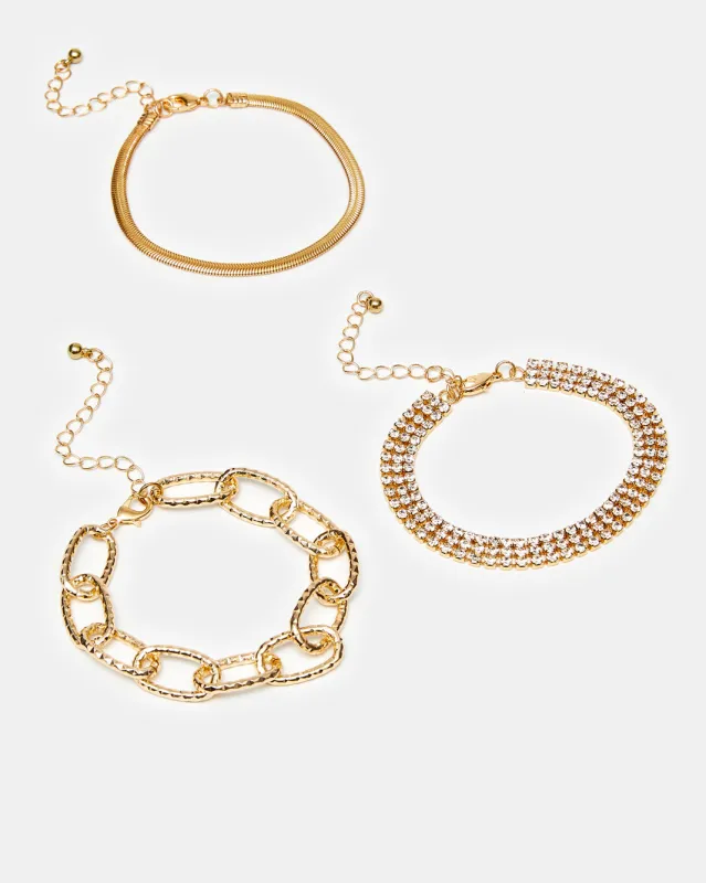 Women Gold Embellished Bracelet Set (Pack of 3) sold by Redtag