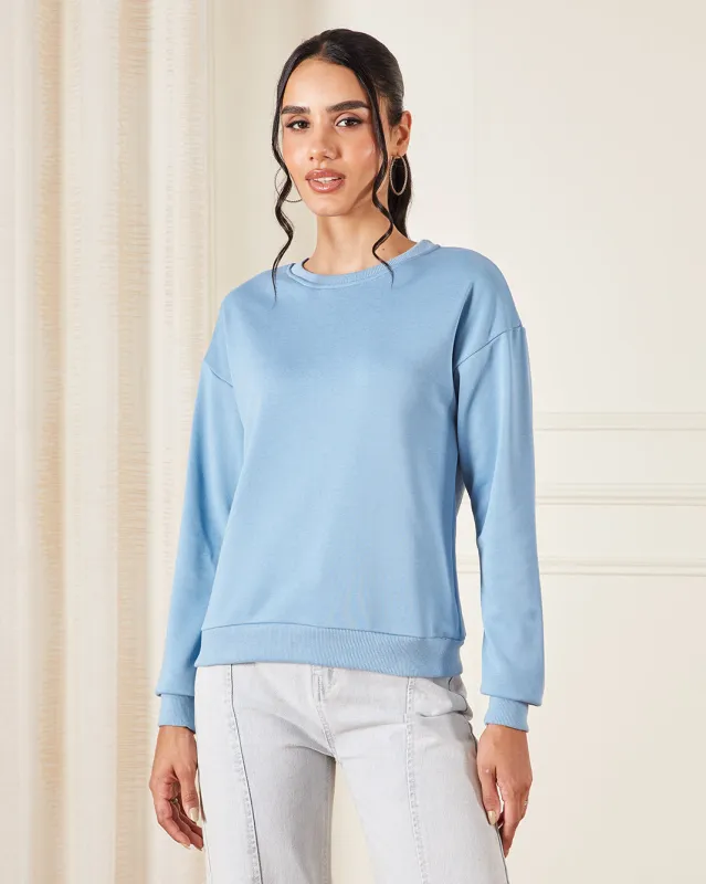 Women Blue Solid Sweatshirt sold by Redtag