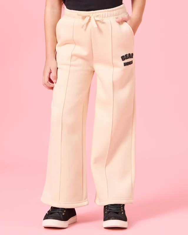 Girls Beige Bear Hugs Placement Print Wide leg Active Track Pants sold by Redtag