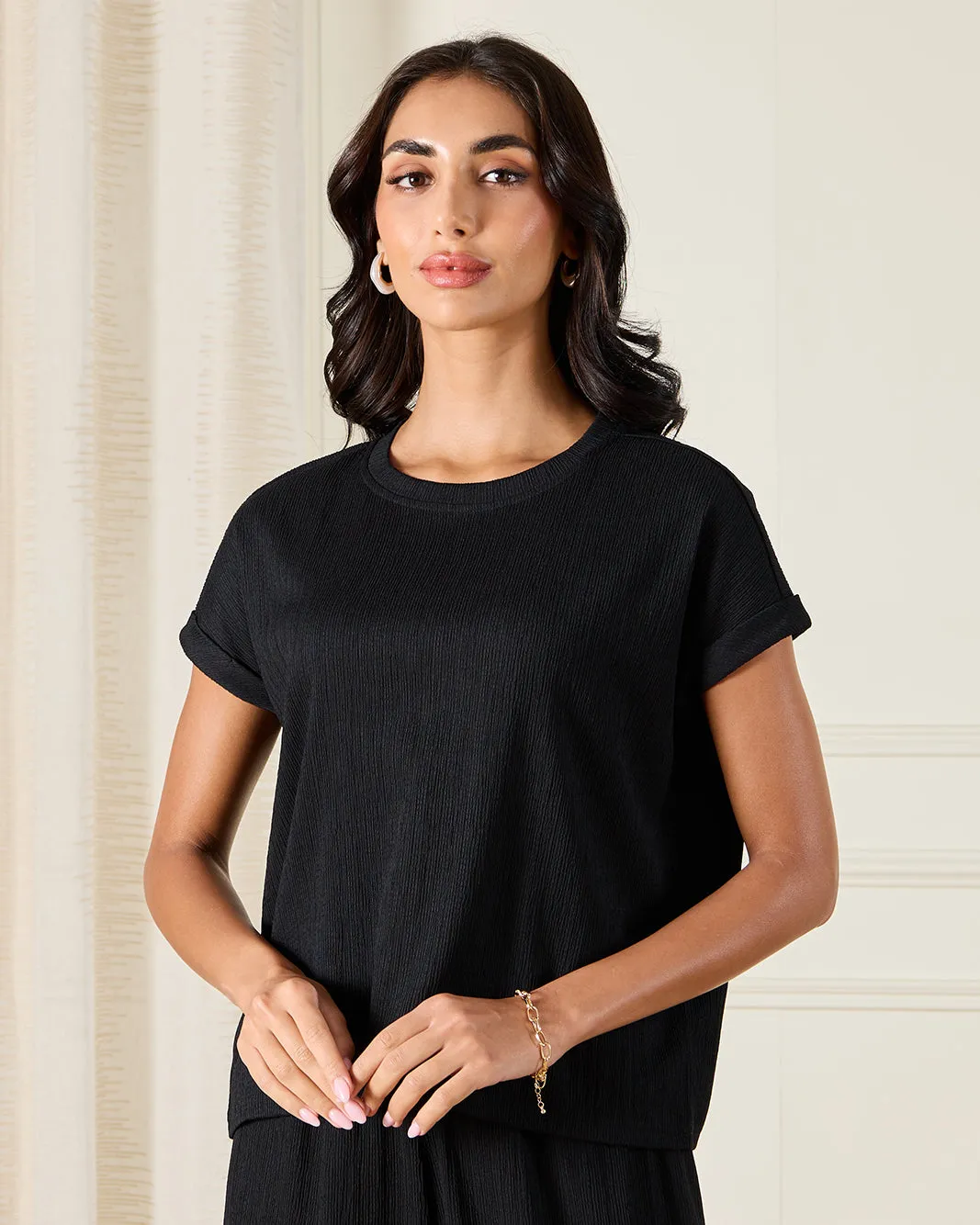 Women Black Textured T-Shirt sold by Redtag