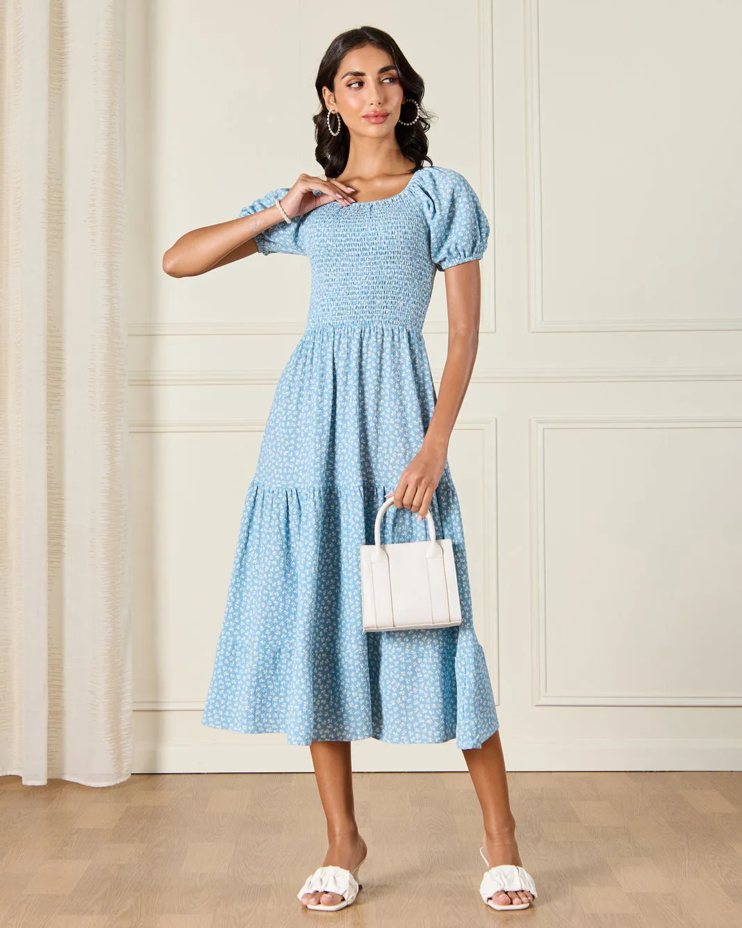 Women Blue Printed Midi Dress sold by Redtag