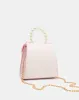 Pink Pearl Embellished Crossbody Bag sold by Redtag