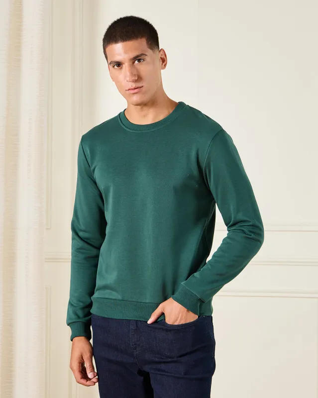 Men Green Solid Sweatshirt sold by Redtag