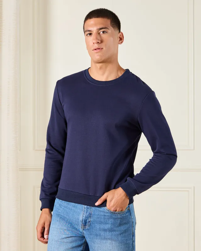 Men Navy Solid Sweatshirt sold by Redtag