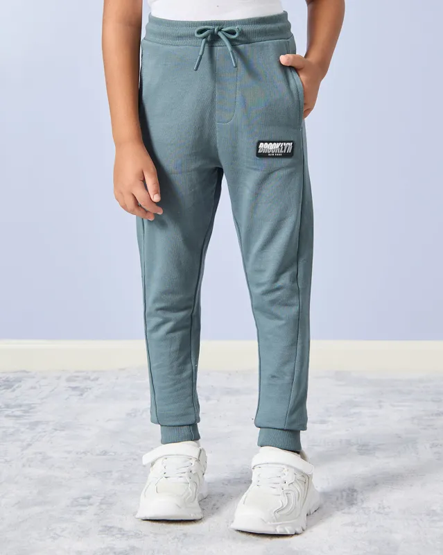 Boys Teal Printed Active Pants sold by Redtag