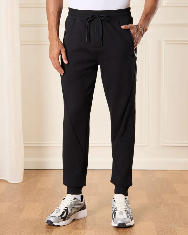 Men Black Solid Active Pant sold by Redtag