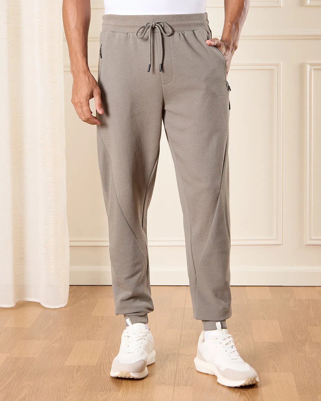 Men Beige Solid Active Pant sold by Redtag