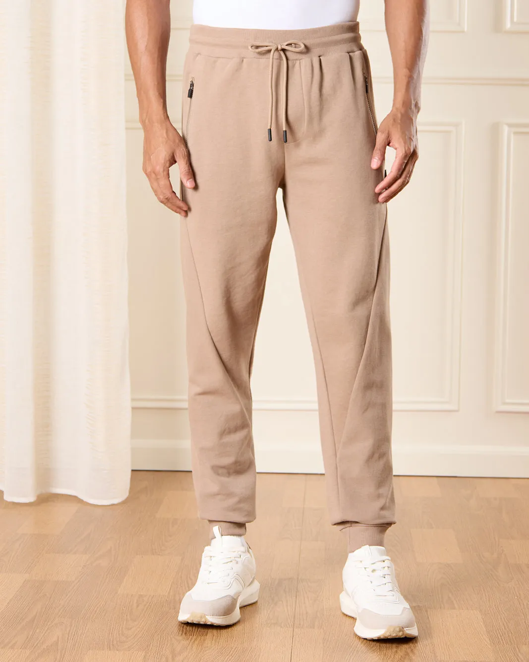 Men Beige Solid Active Pants sold by Redtag