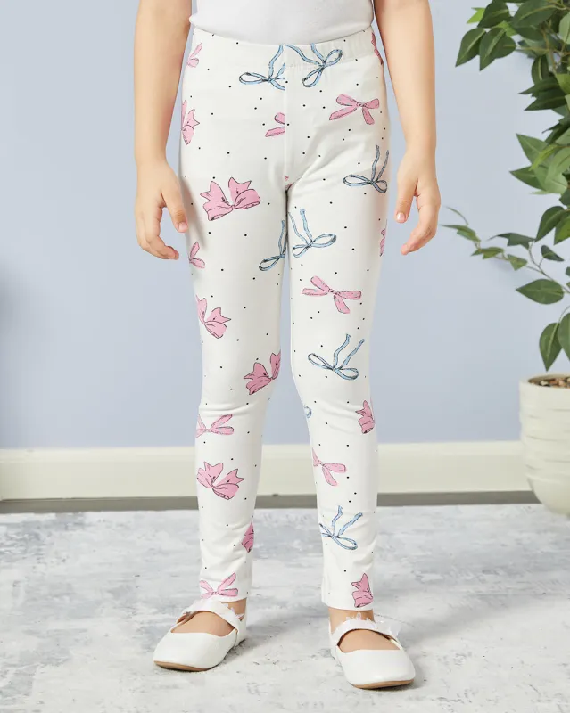 Girls Ivory Bow Print Leggings sold by Redtag