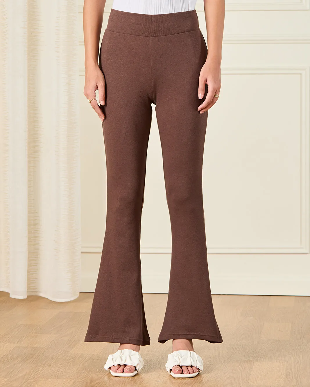 Women Brown Ribbed Flared Leggings sold by Redtag