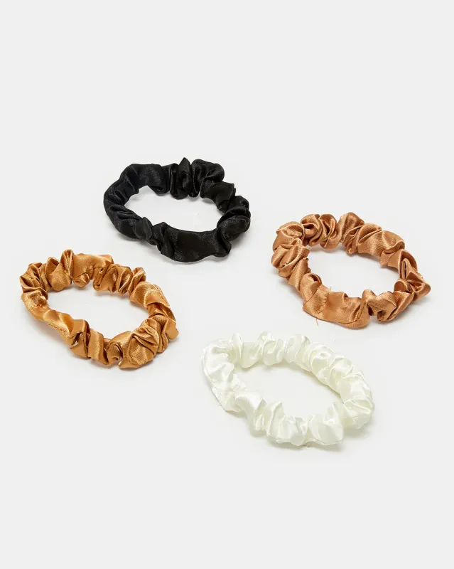 Women Assorted Elastic Hair Band Set (Pack of 4) sold by Redtag