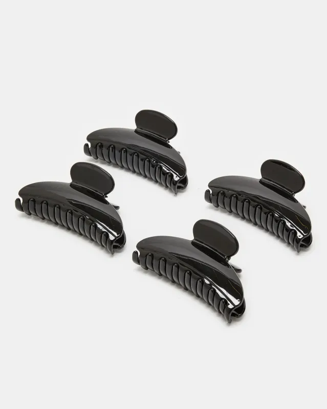 Women Black Hair Claw Set (Pack of 4) sold by Redtag