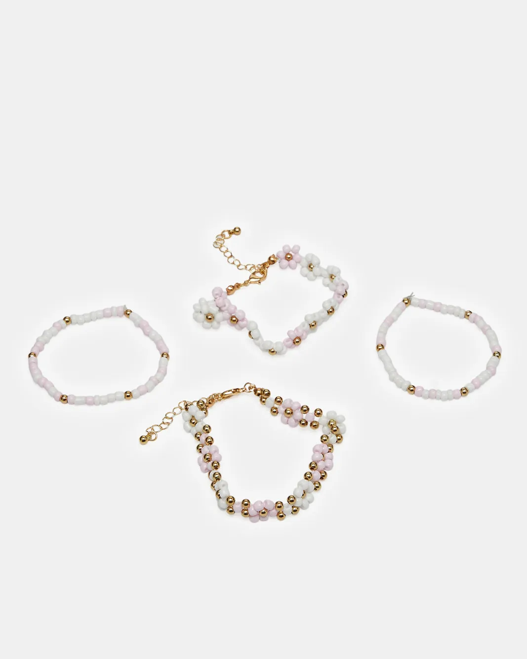 Girls Gold And White Embellished Bracelet Set (Pack of 4) sold by Redtag