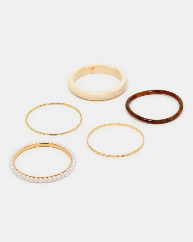 Women Gold Embellished Bangle Set (Pack of 5) sold by Redtag