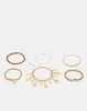 Women Gold Embellished Bracelet Set (Pack of 6) sold by Redtag