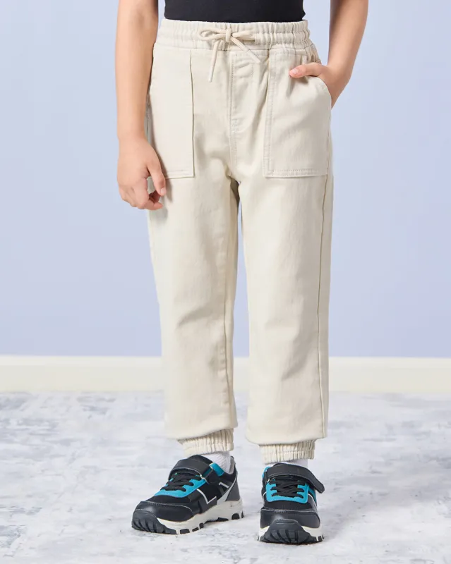 Boys Cream Plain Jogger Jeans sold by Redtag
