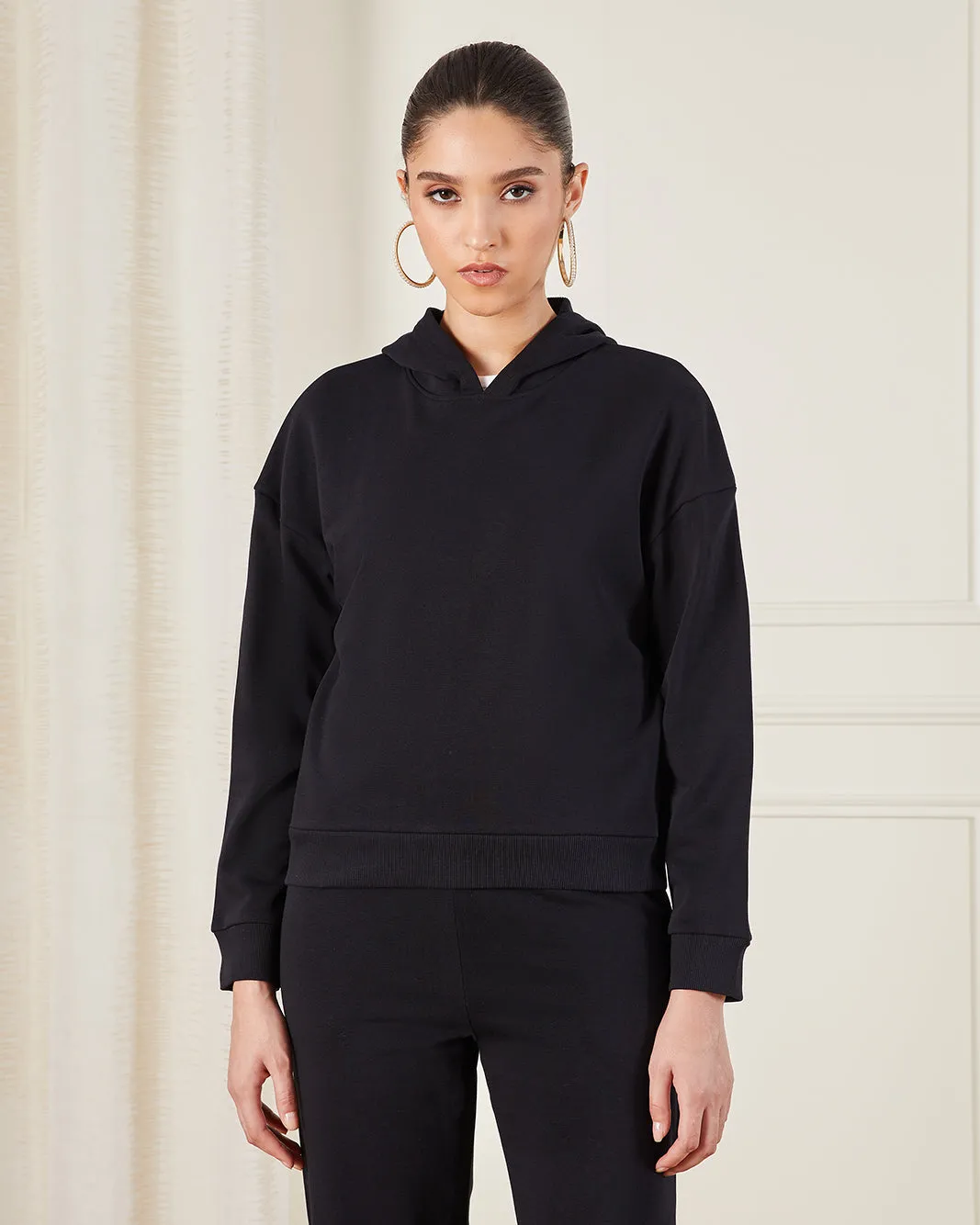 Women Black Basic Hooded Sweatshirt sold by Redtag