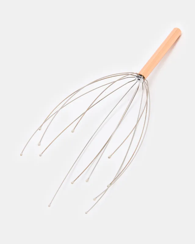 Women Gold Head Massager sold by Redtag