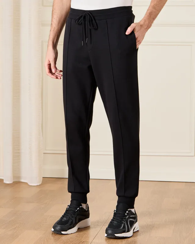 Men Black Plain Track Pants sold by Redtag