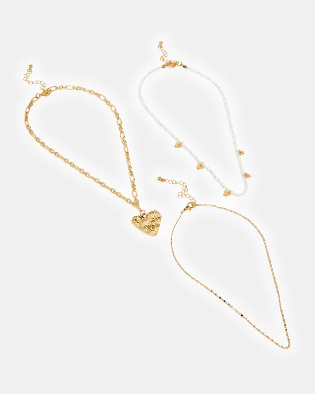 Women Gold Necklace Set (Pack of 3) sold by Redtag