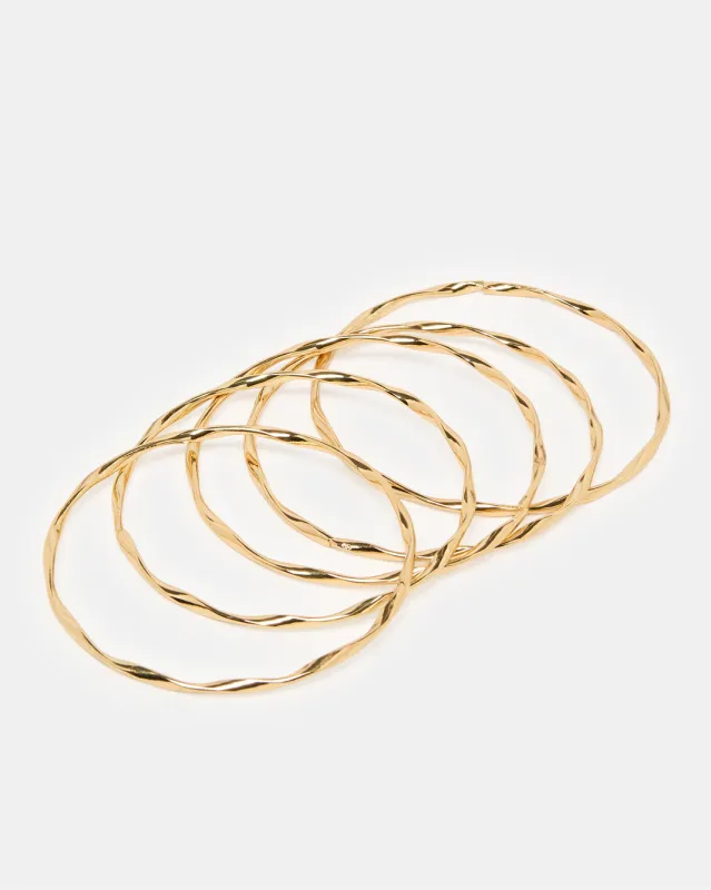 Women Gold Bangle Set (Pack of 5) sold by Redtag
